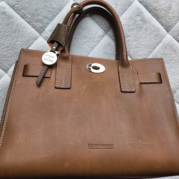Dooney & Bourke Bag10.5x8x5 inches Olive color Very Good Condition